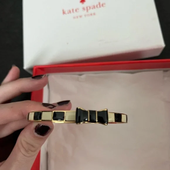 Kate Spade black and gold bow bracelet. - Picture 4 of 4
